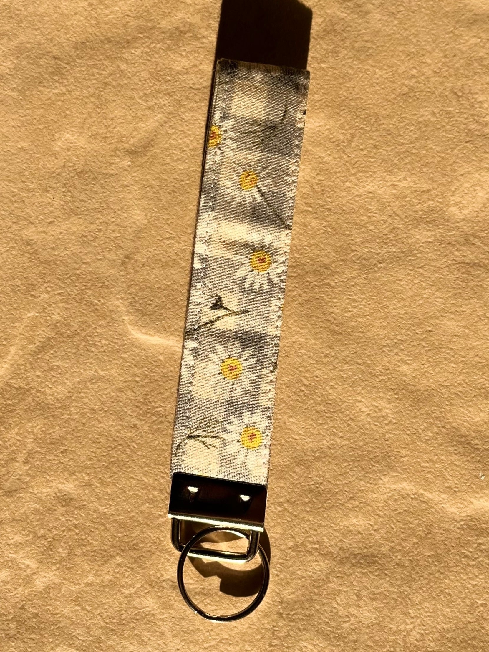 Grey Daisies Wristlet