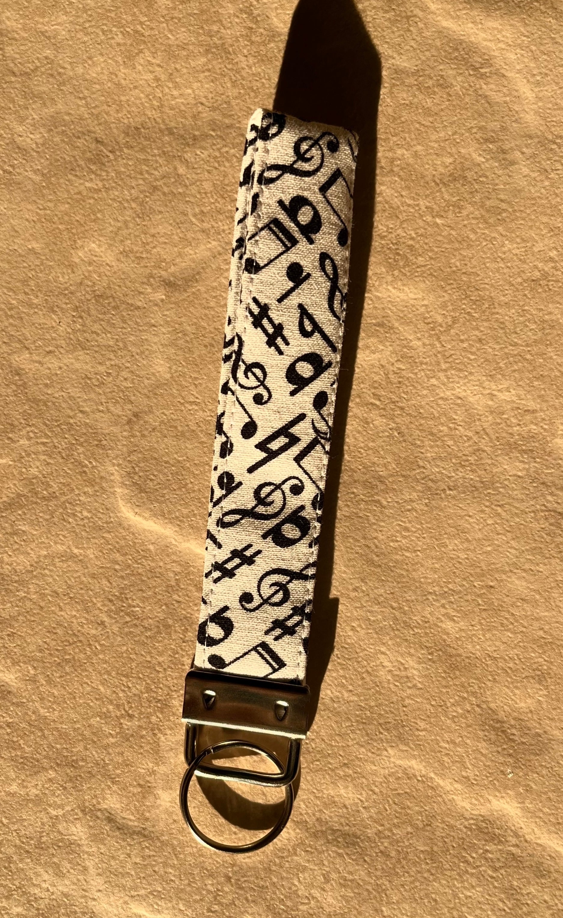 Solid White & Black Notes Wristlet