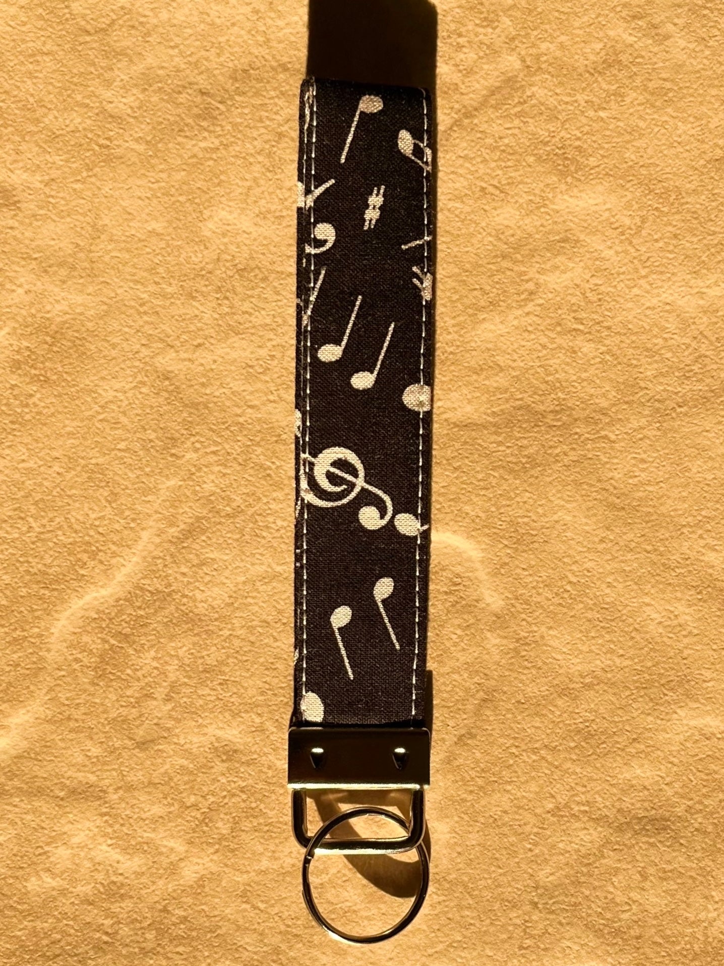 Solid Black & White Notes Wristlet