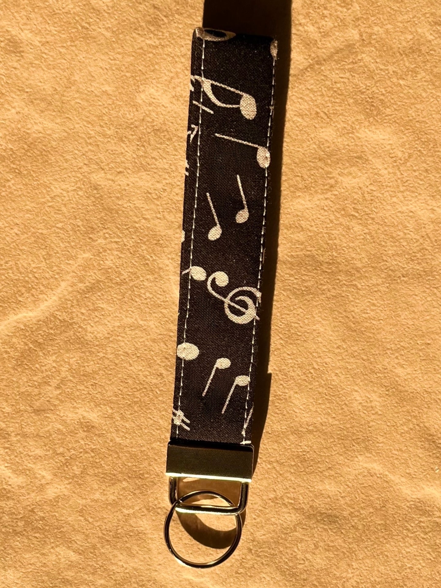 Solid Black & White Notes Wristlet
