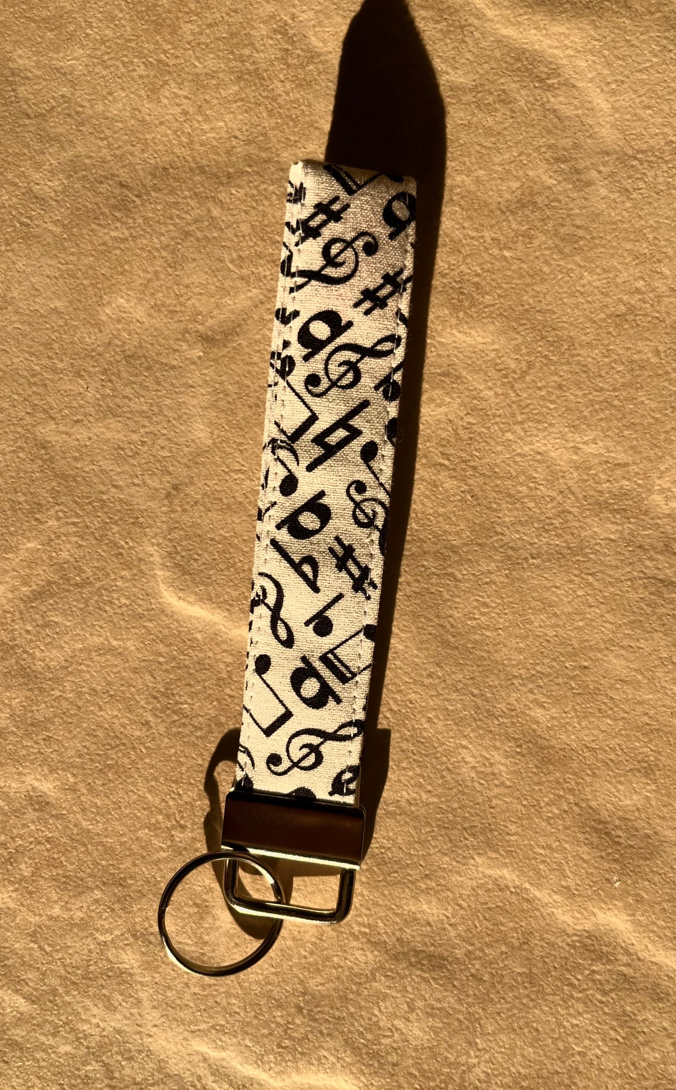Solid White & Black Notes Wristlet